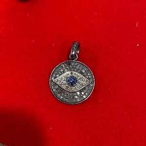 Evil eye pendant with black diamonds